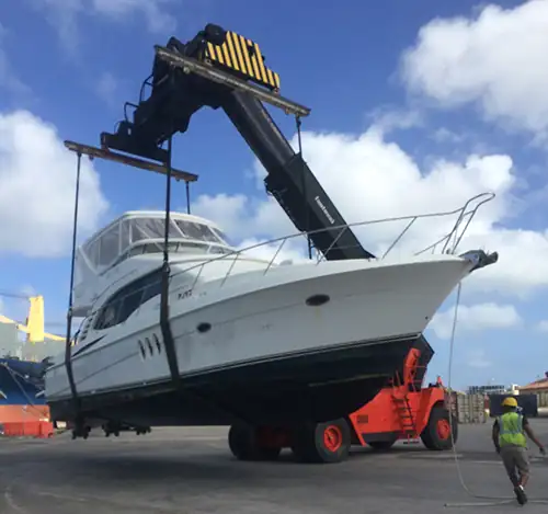 Weekly Boat Transportation Lines and Schedules Yacht on a large transport ship, symbolizing weekly boat transportation lines and schedules.